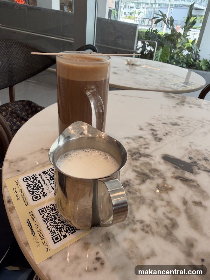 Coffee and milk in café interior