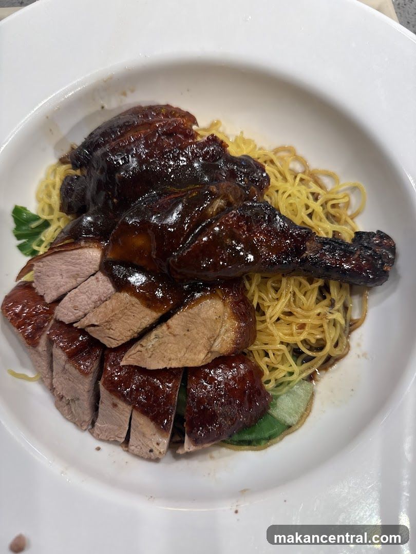 Dish of Roasted Duck over Noodles