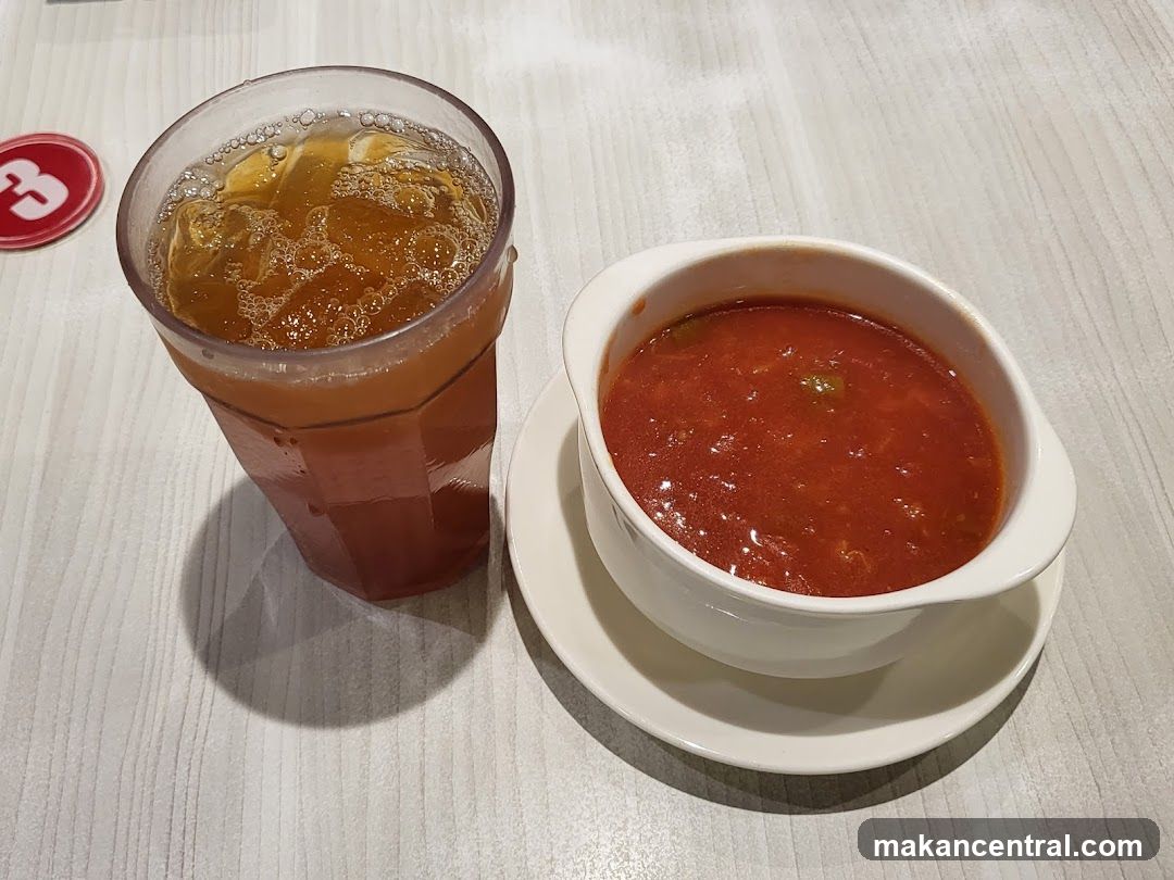 Table Setting with Beverage and Soup