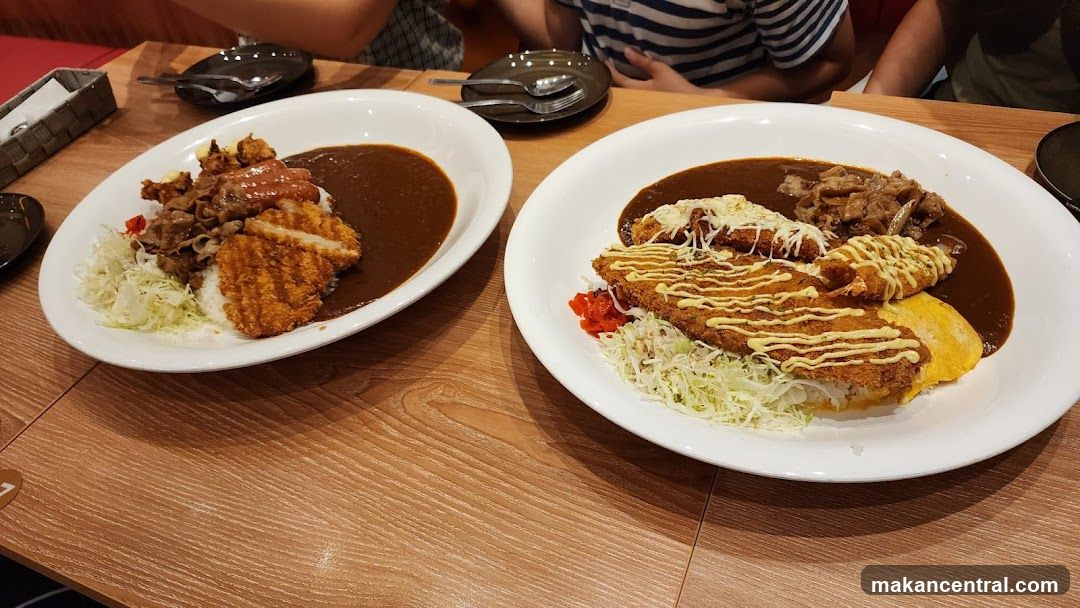 Restaurant Interior with Two Plates of Food