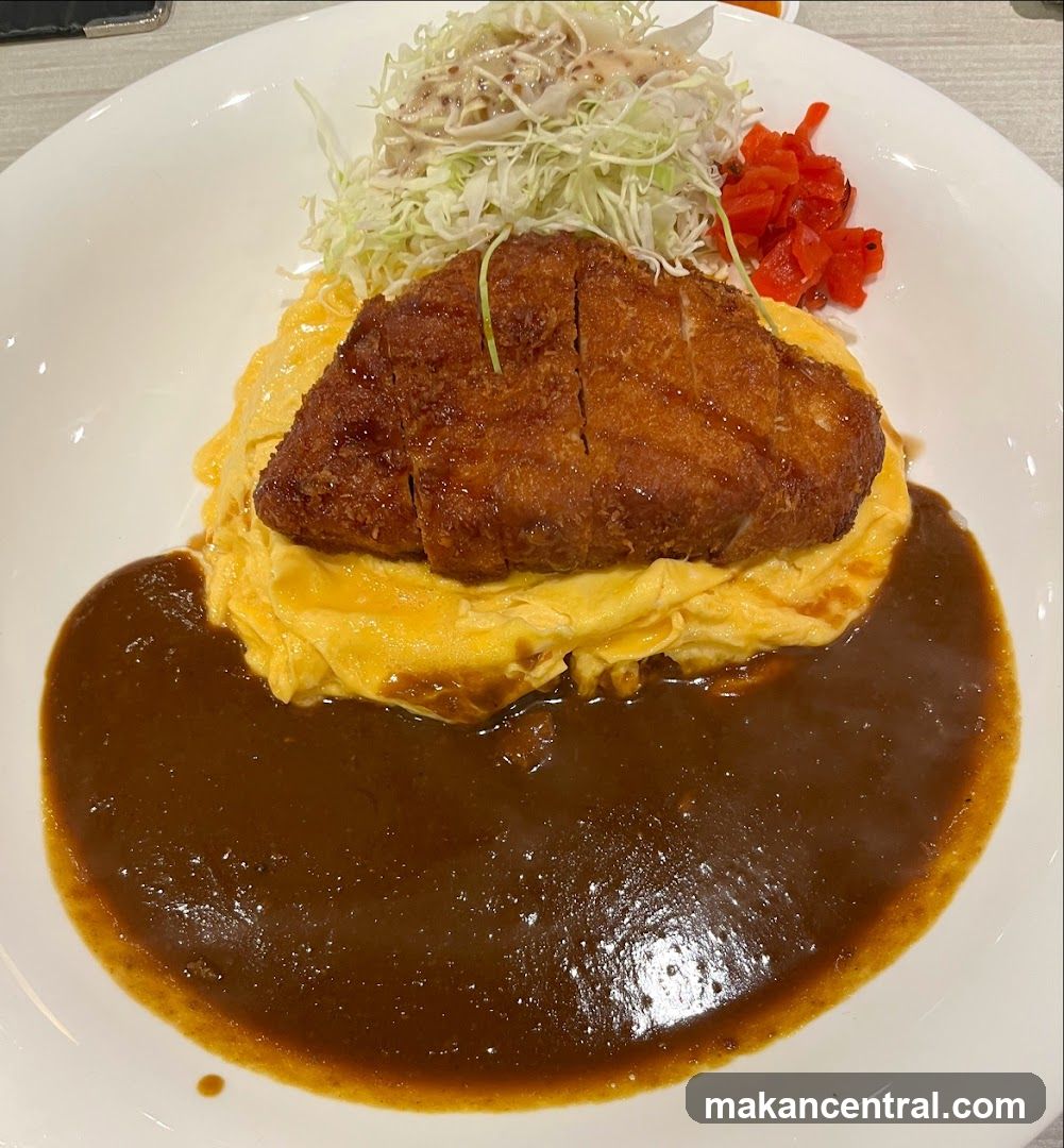 Crispy Pork Cutlet Omelette with Gravy and Side Salad