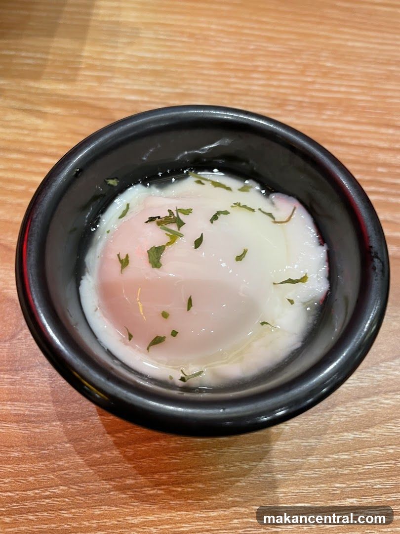 Poached Egg in Black Bowl