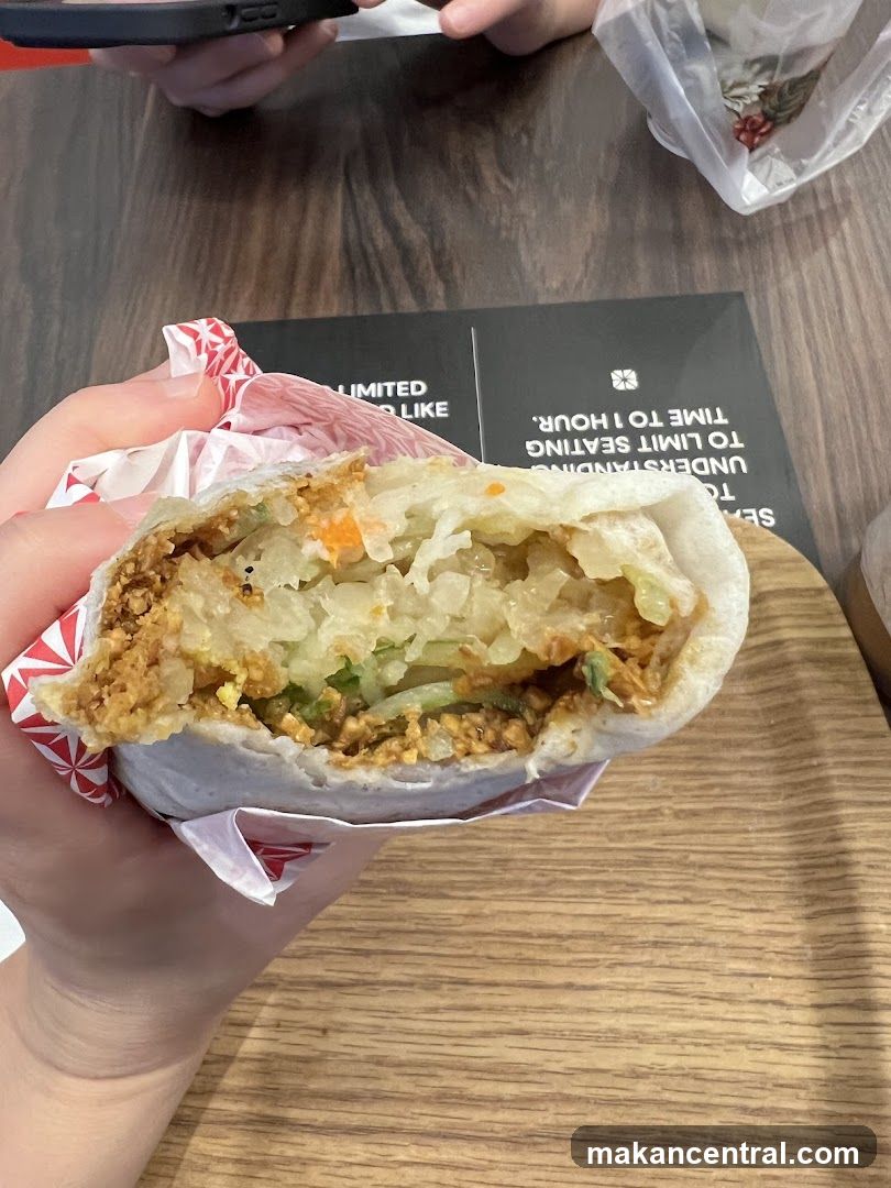 Hand holding food item