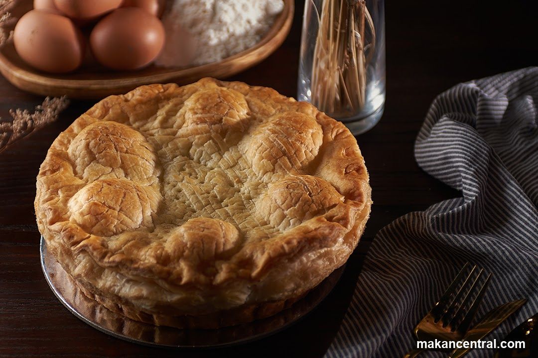 Baked Pie with Ingredients and Table Setting