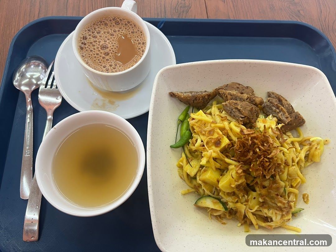 Food Tray with Noodles, Tea, and Soup