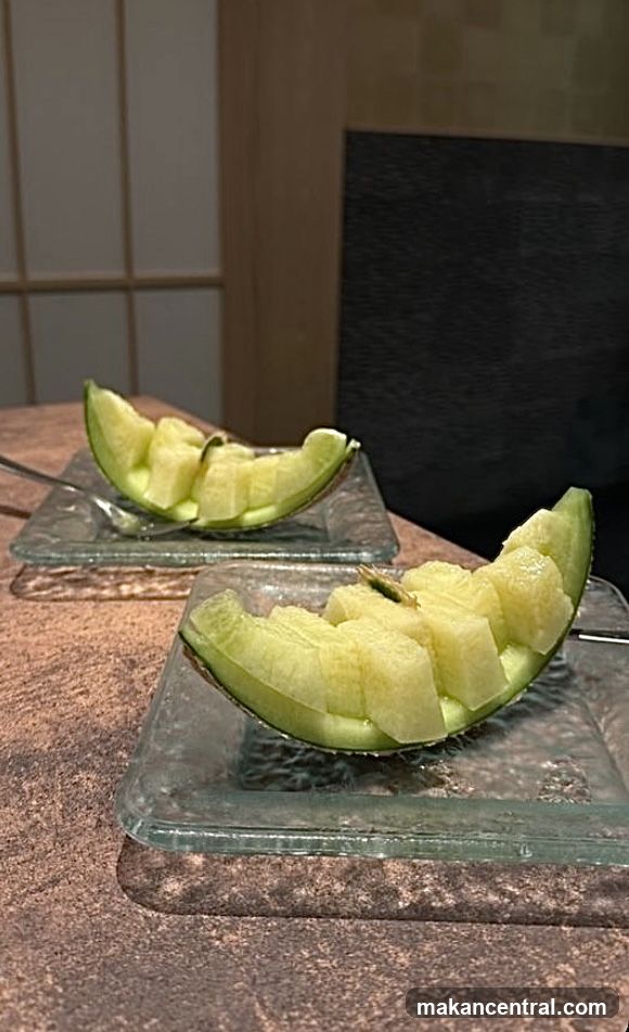 Melon Slices on Glass Plates