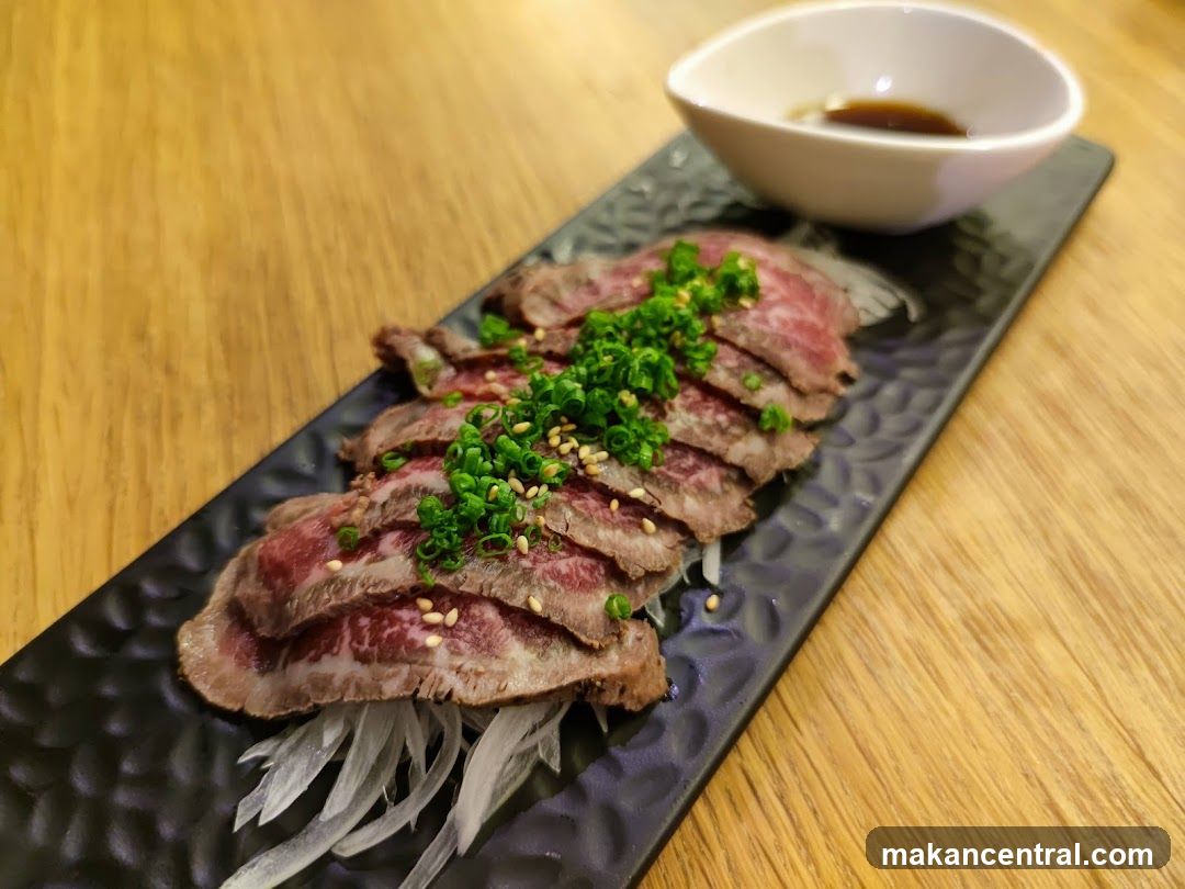 Sliced beef dish with garnish