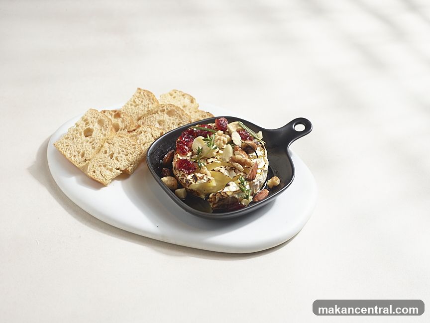 Baked Brie with Nuts and Cranberries