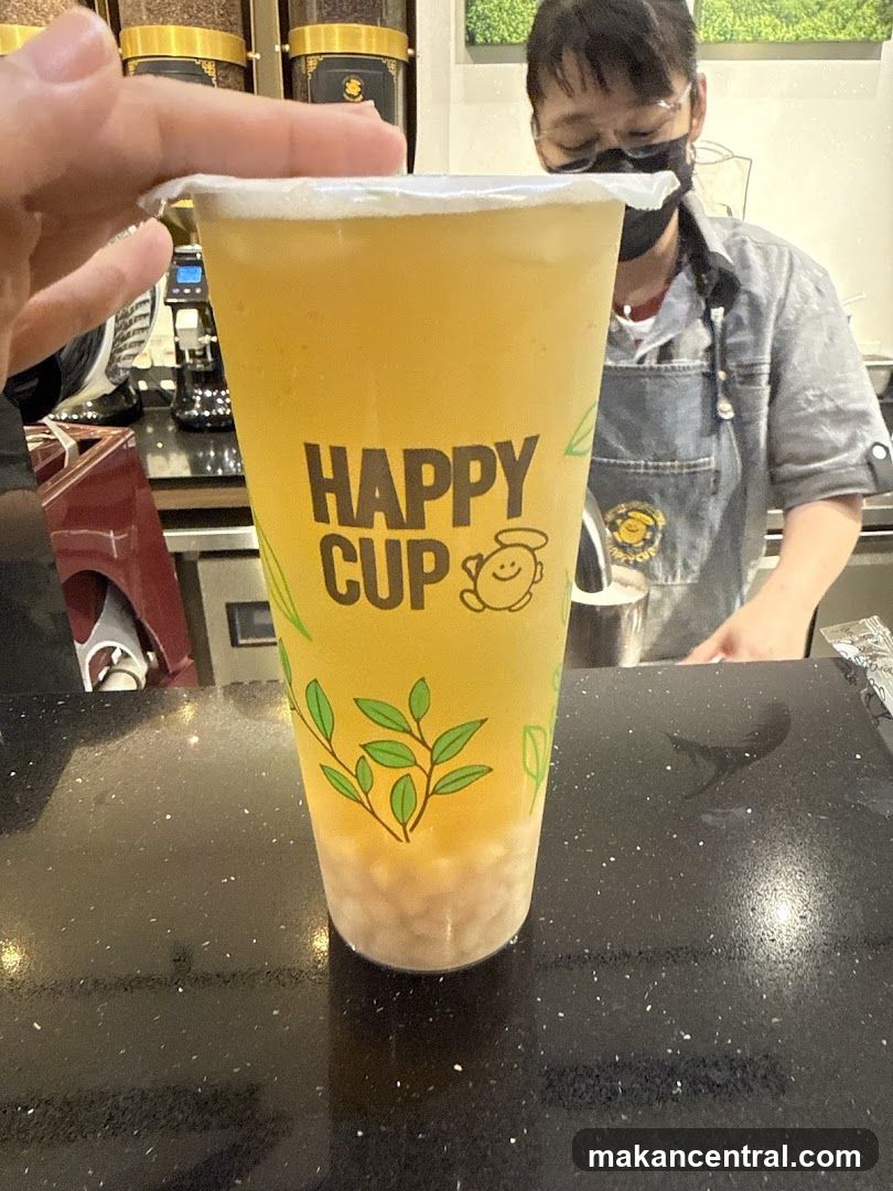 Beverage with "Happy Cup" Logo