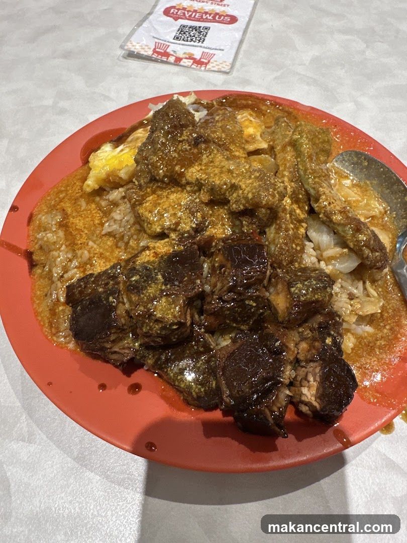 Plate of food with meat and rice