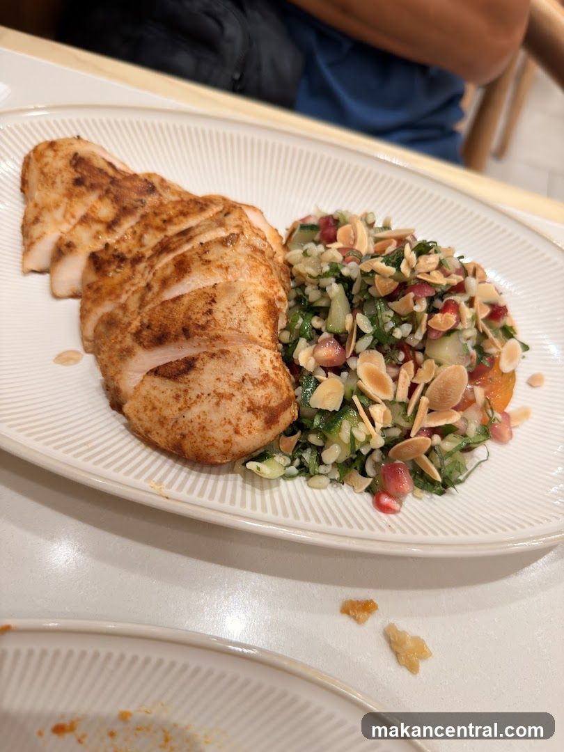 Sliced chicken breast with salad