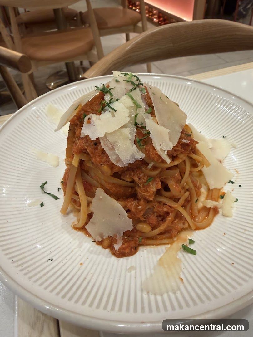 Pasta with Tomato Sauce and Shaved Parmesan