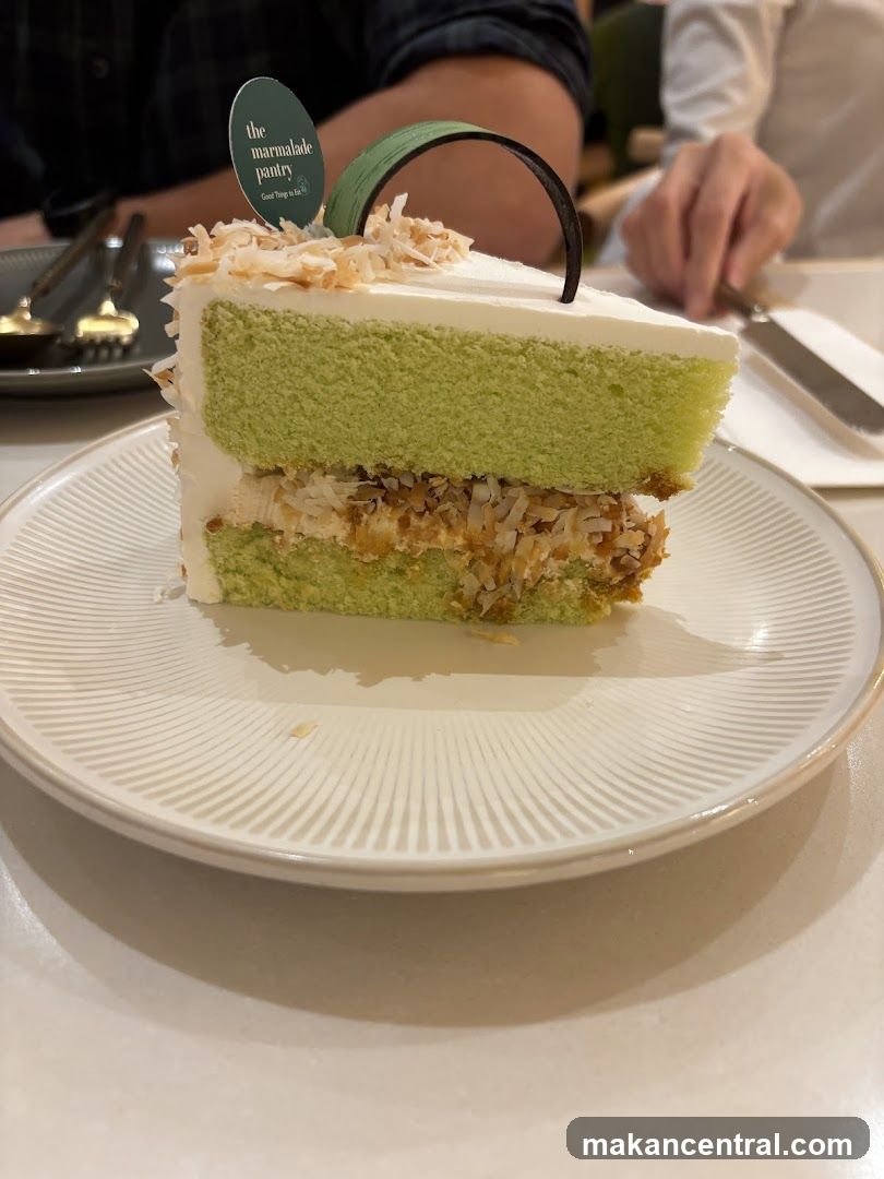 Slice of cake with coconut flakes