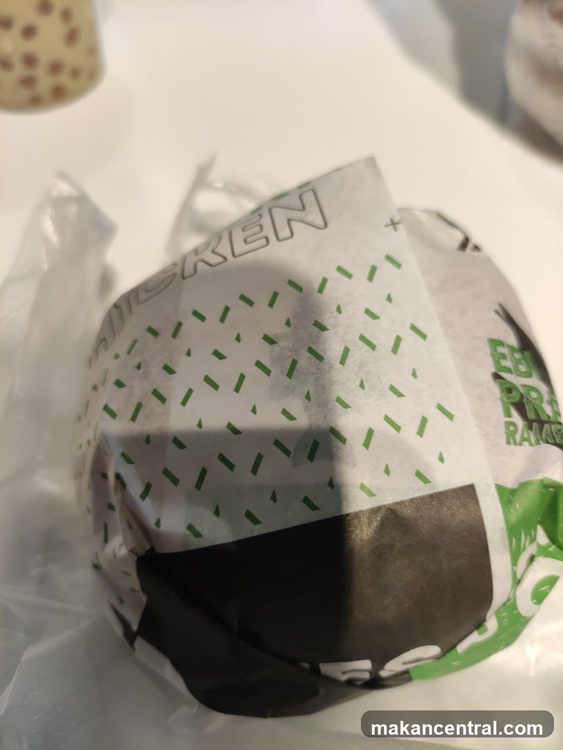 Burger Wrapped in Branded Paper