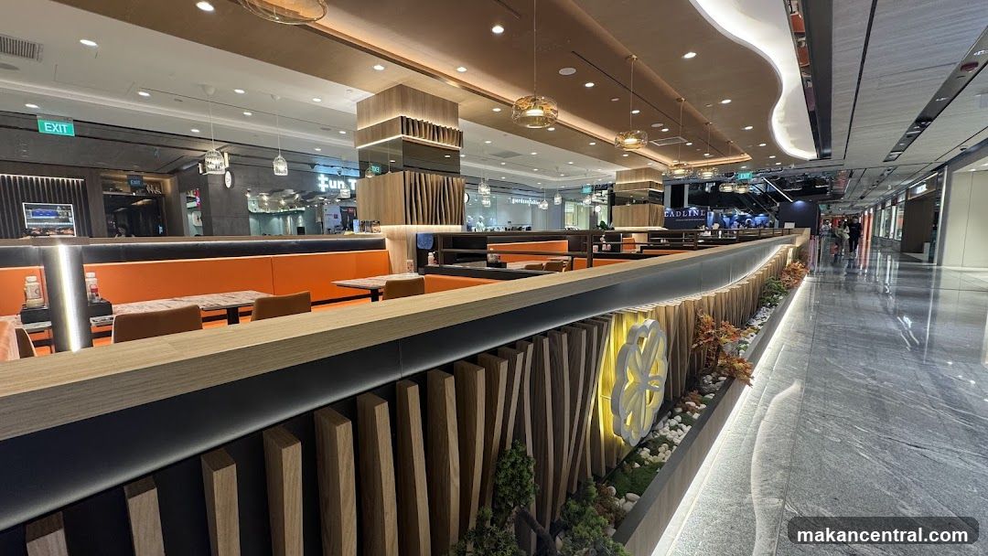 Restaurant Interior with Orange Booths and Wood Accents