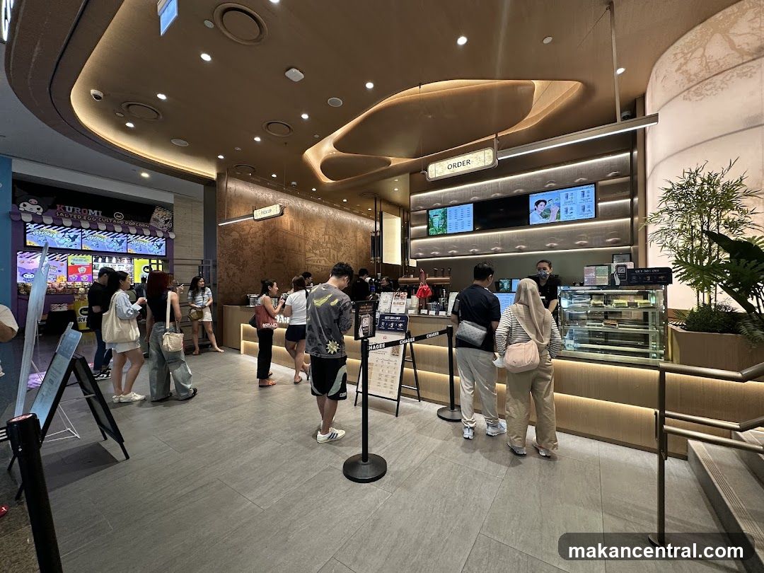 People Ordering at a Food Counter
