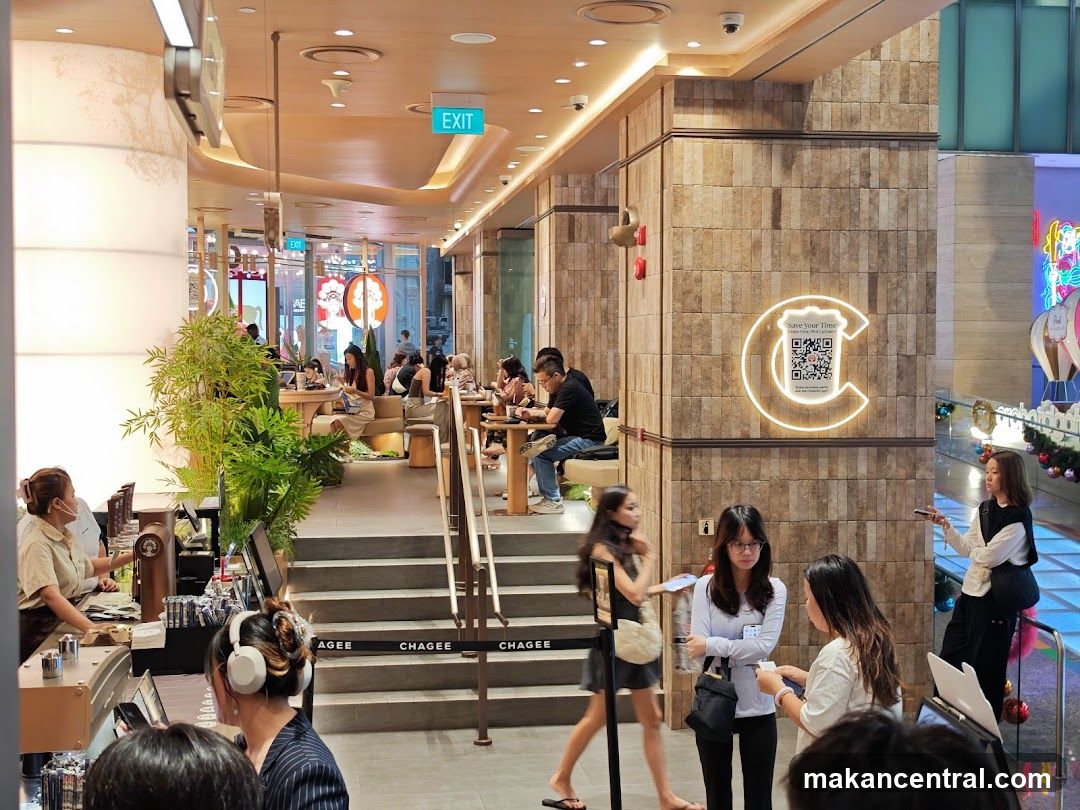 Modern Cafe Interior with Seating and Bar Area