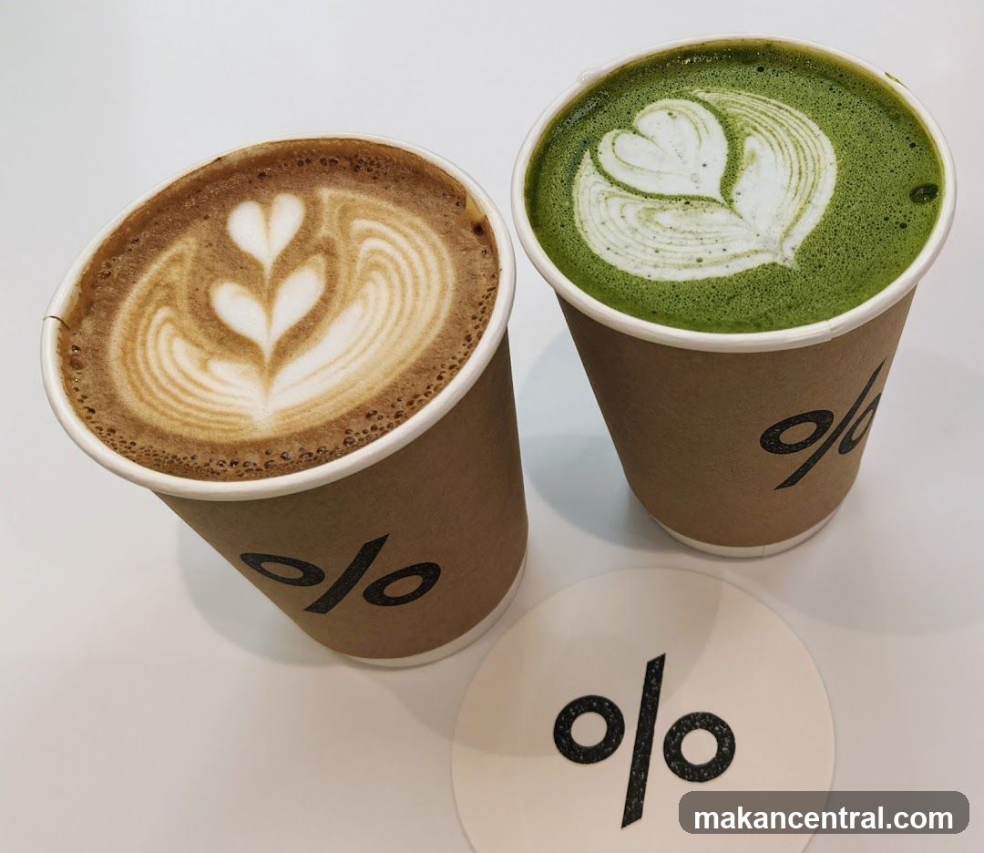 Two coffee drinks with latte art