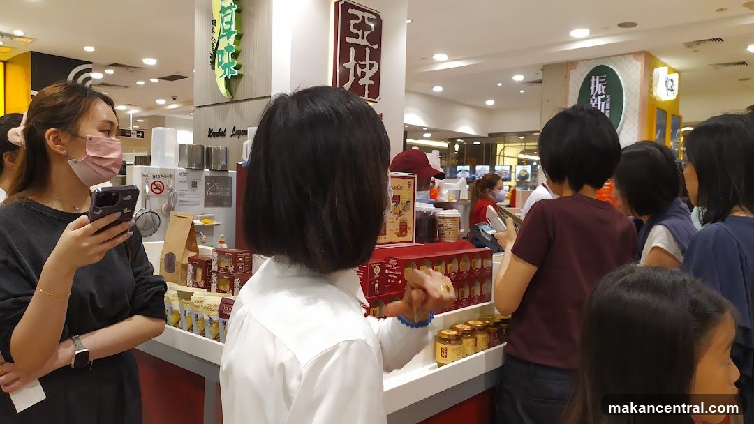 People at a food stall