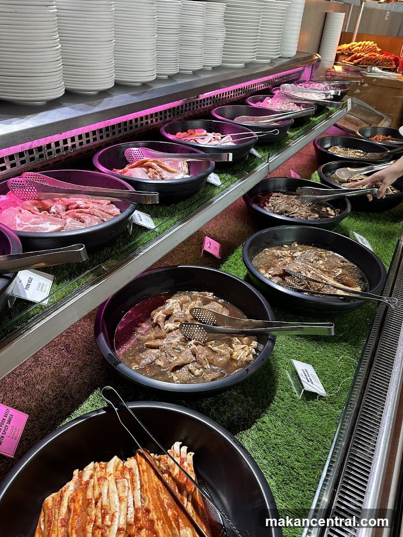Buffet Display of Meats and Kimchi