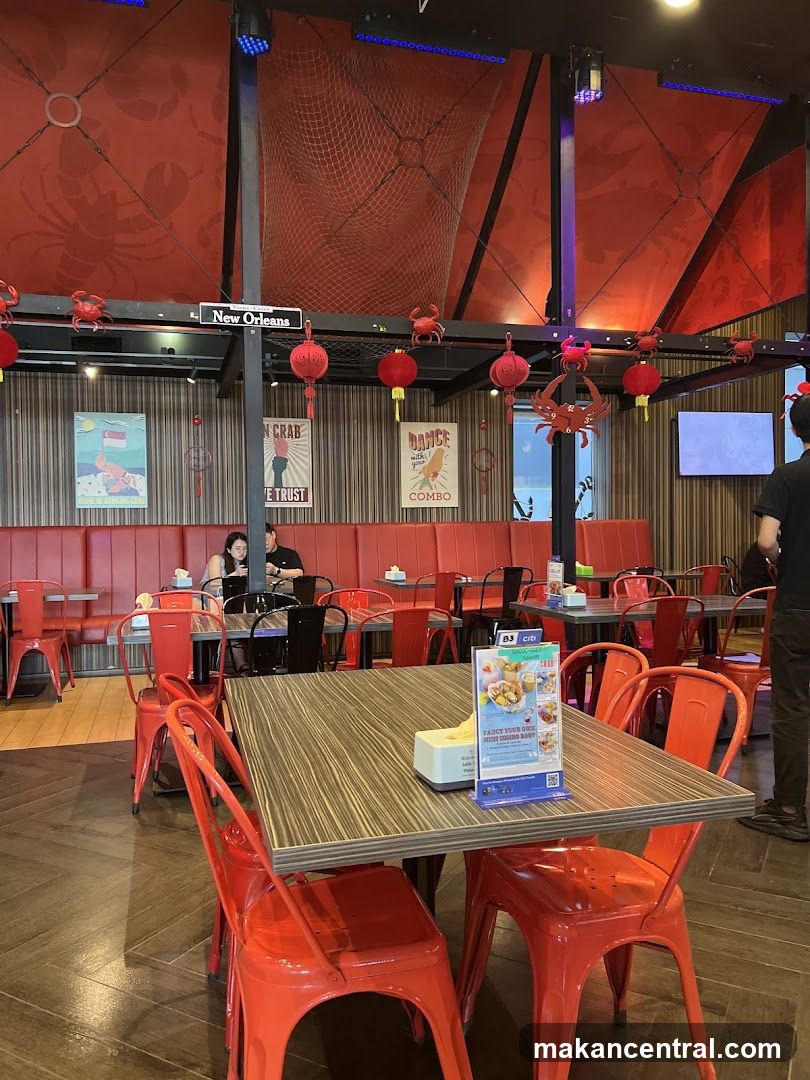 Restaurant Interior with Red Chairs and Crab Decor