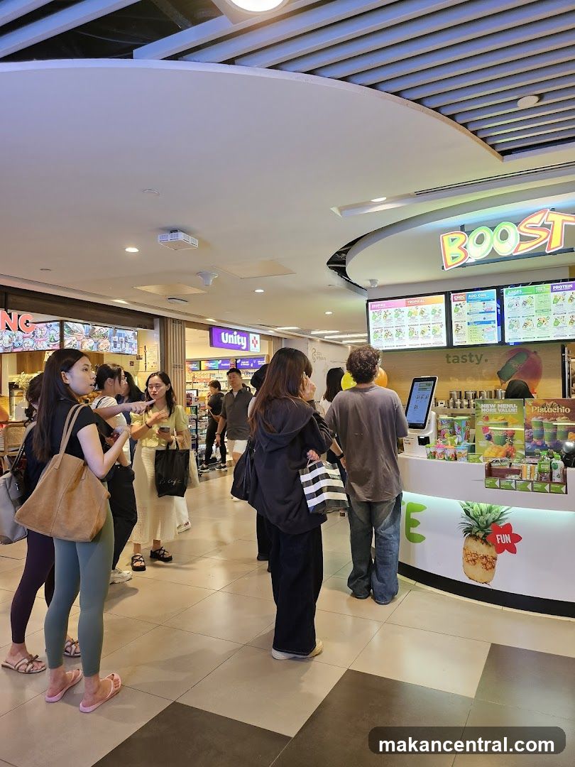 People queuing at a juice bar