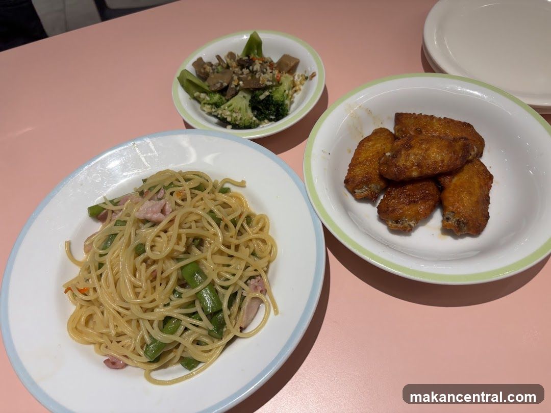 Three dishes on a pink table