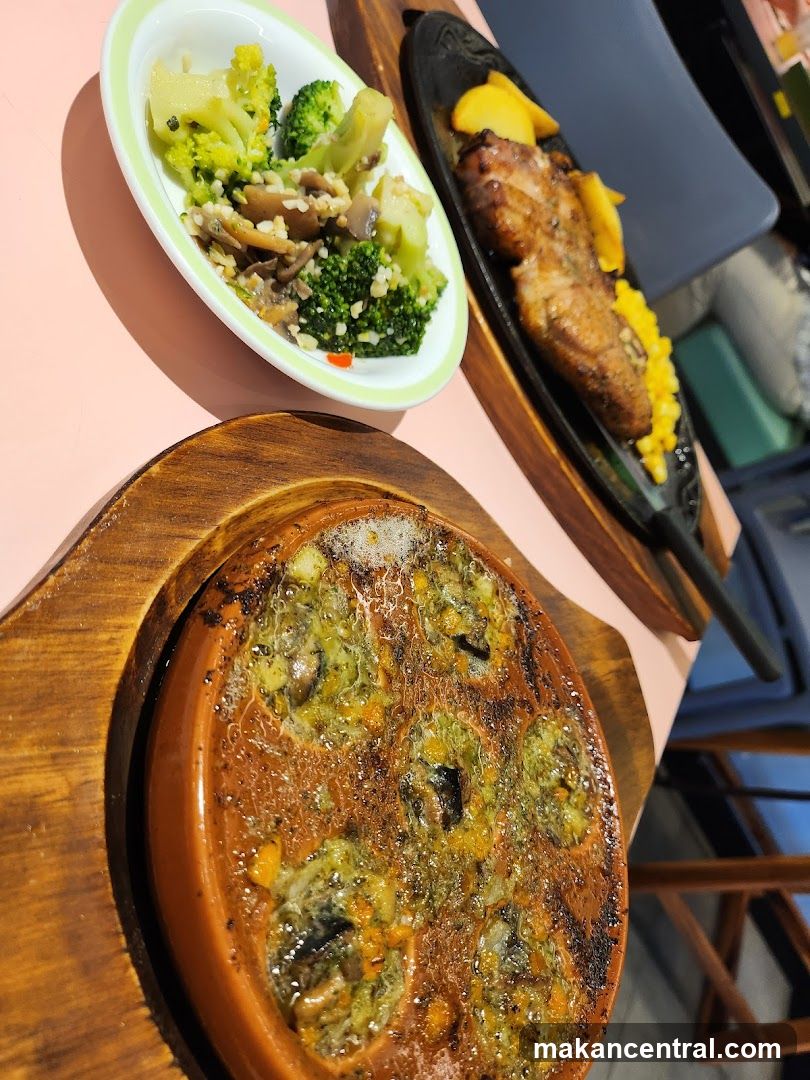 Sizzling Escargots and Steak Dinner