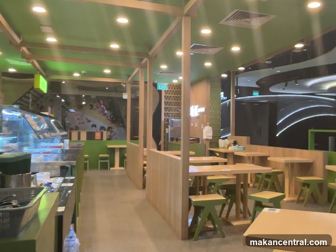 Indoor dining area with climbing wall
