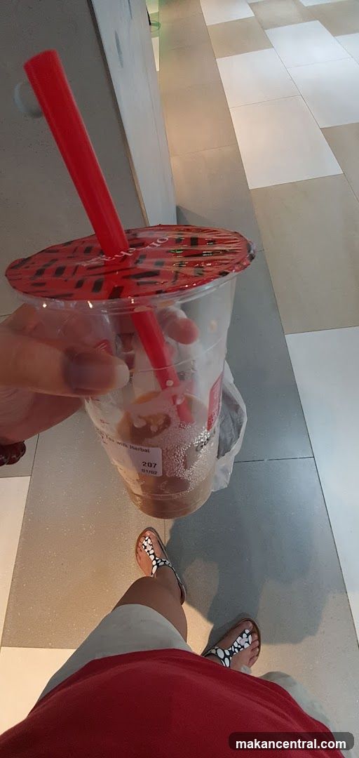 Person holding a bubble tea
