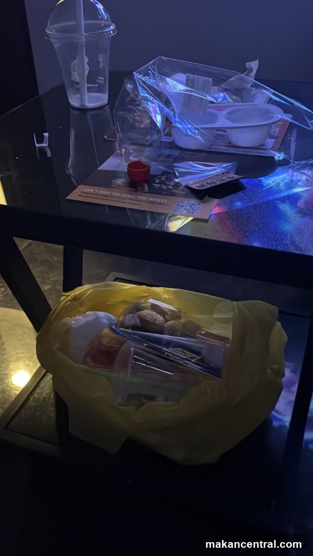 Table with trash and flyer