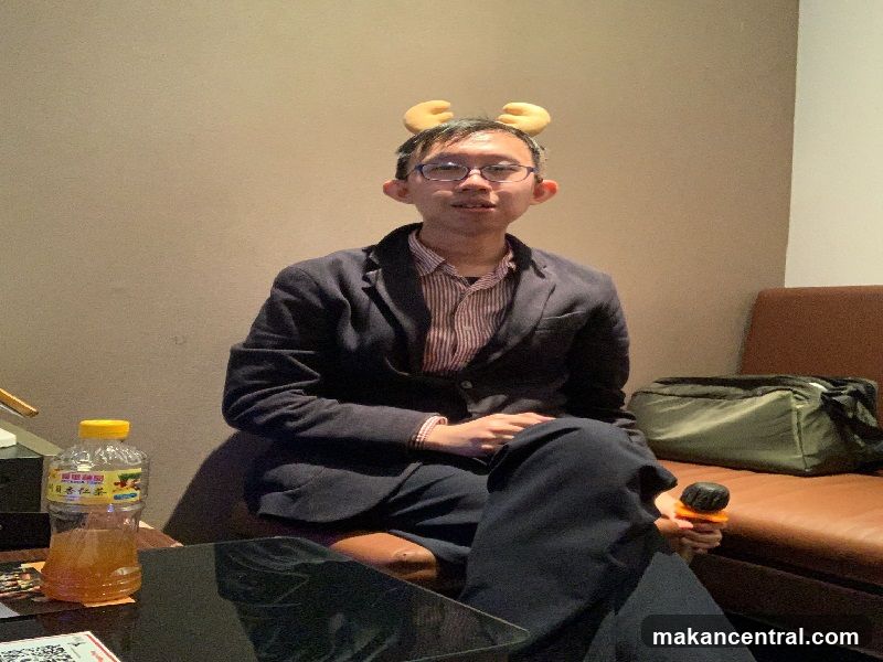 Man wearing reindeer antlers