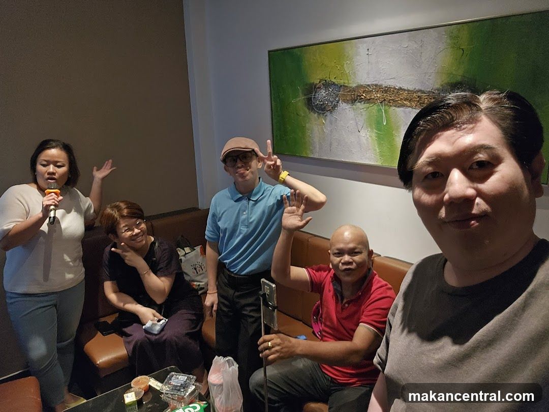 Group enjoying karaoke