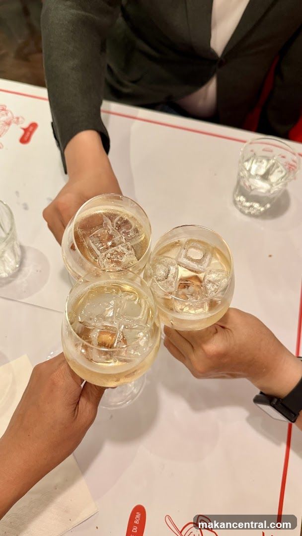 People toasting with drinks