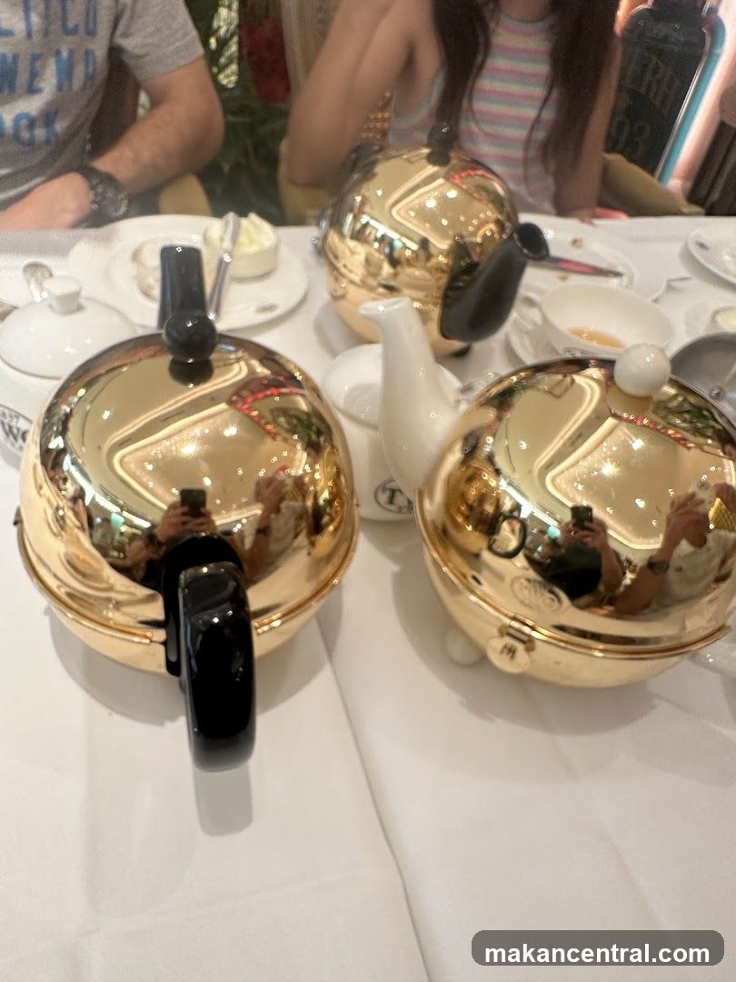 Golden Teapots on a Table