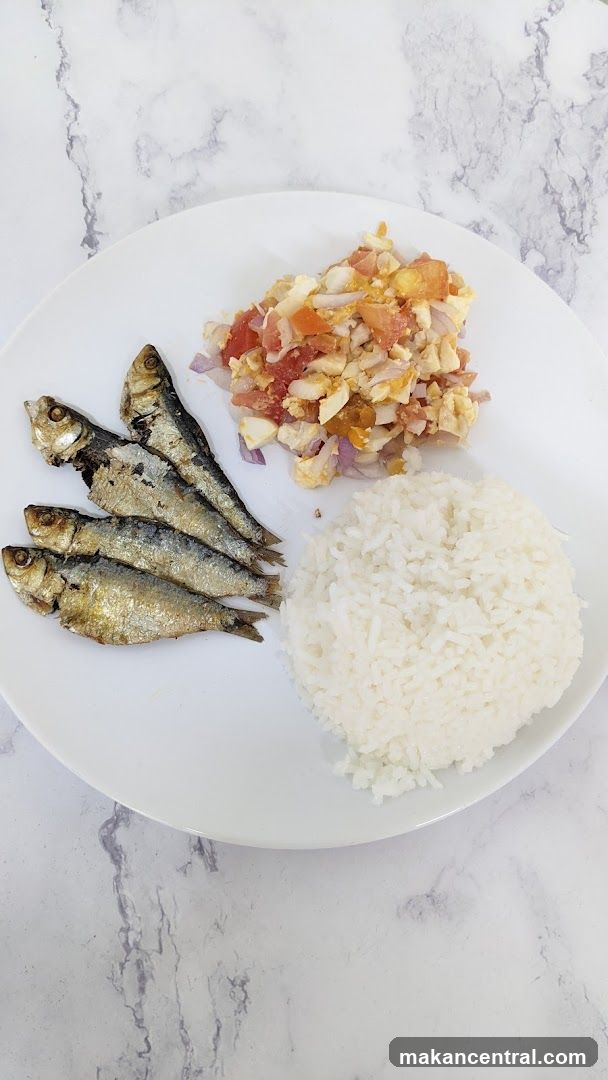Fried Sardines with Rice and Tomato Salad