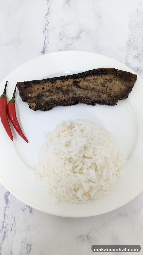 Grilled Meat with Rice and Chili Peppers