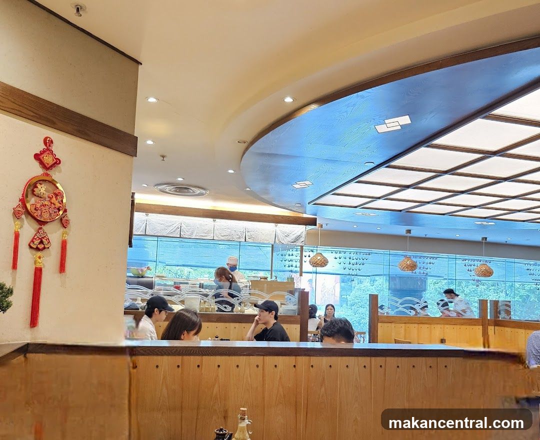 Restaurant Interior with Diners and Sushi Bar