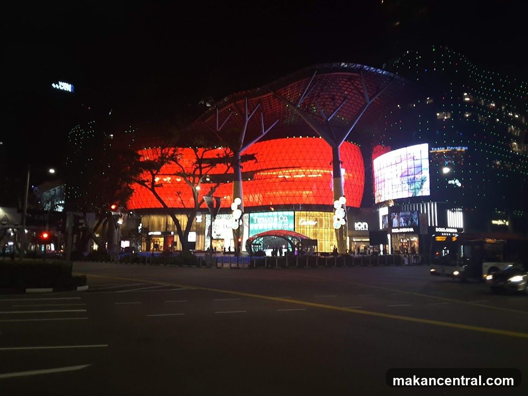 Night view of a brightly lit shopping complex