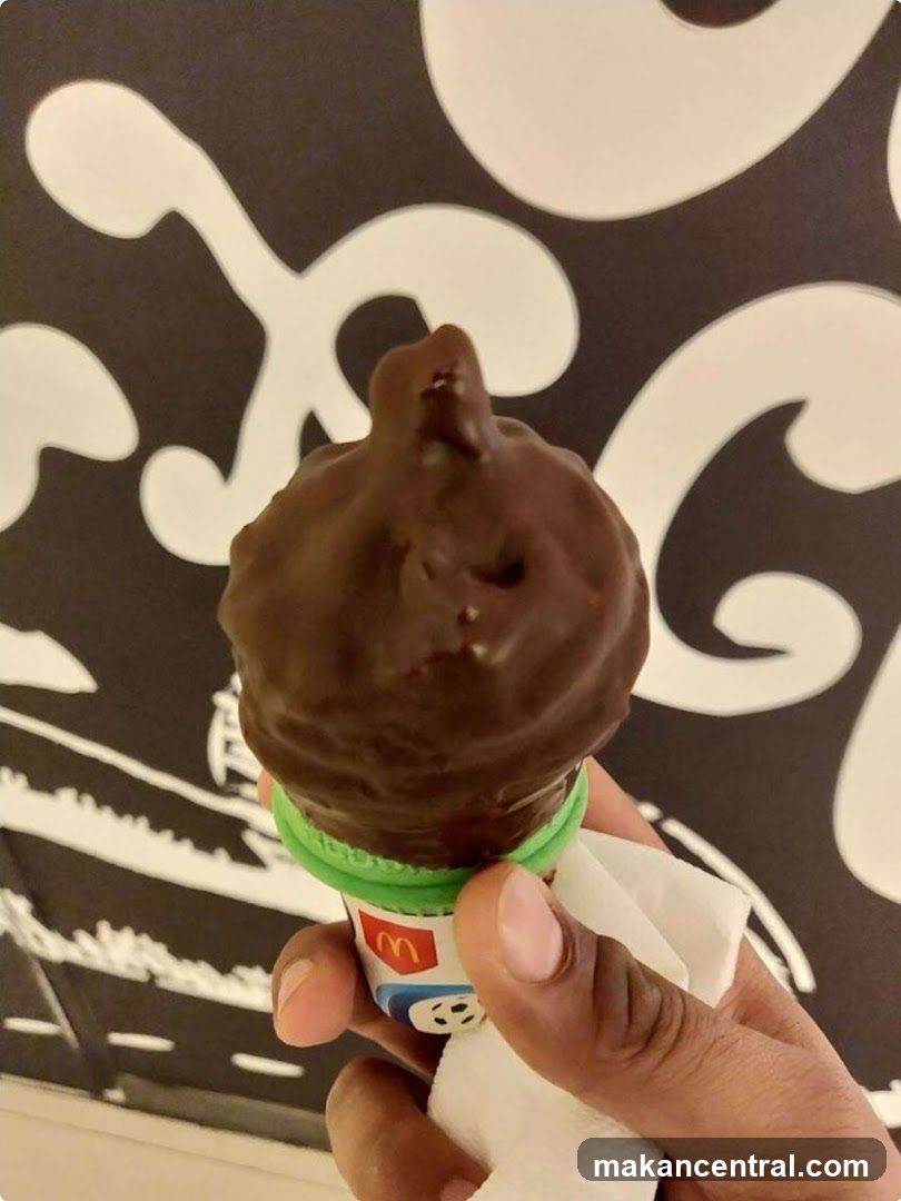 Chocolate-dipped ice cream cone