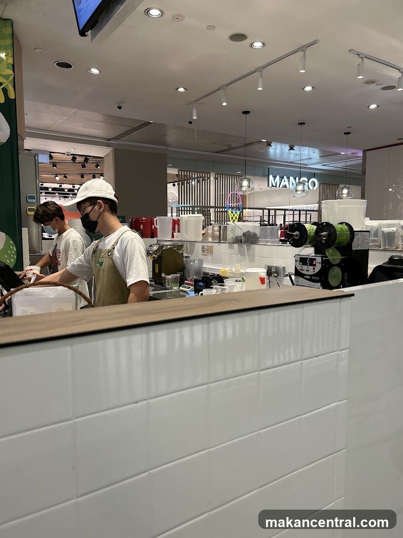Staff preparing drinks at a counter