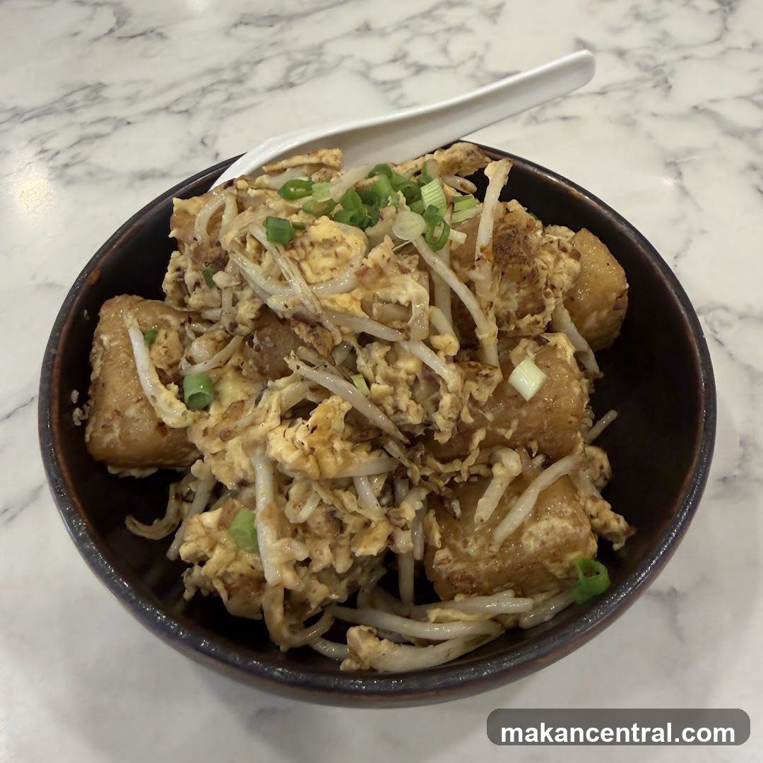 Stir-fried Turnip Cake with Eggs and Bean Sprouts