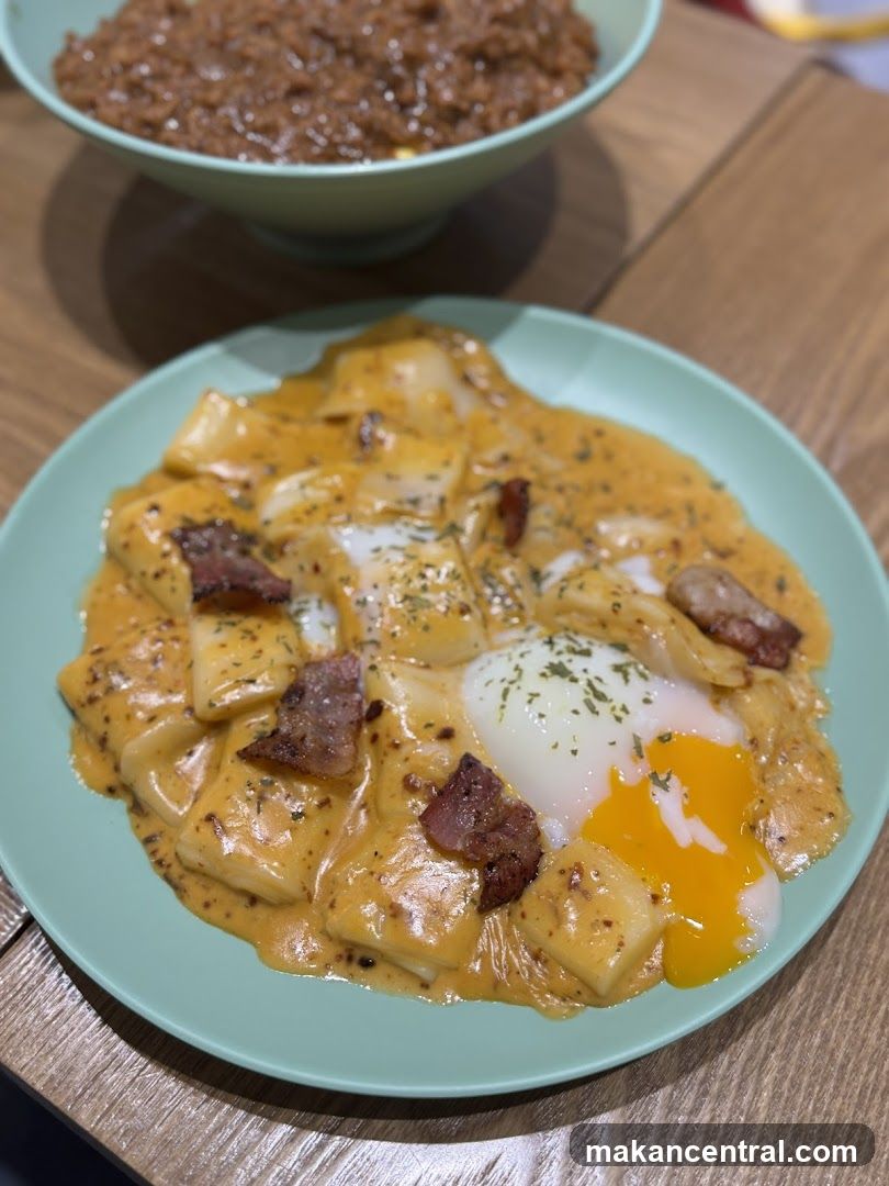 Creamy Tteokbokki with Bacon and Egg
