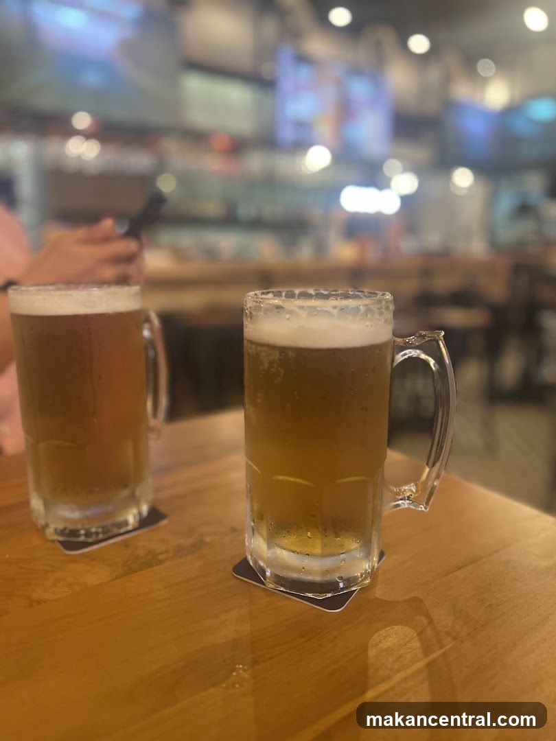 Two Mugs of Beer on a Table