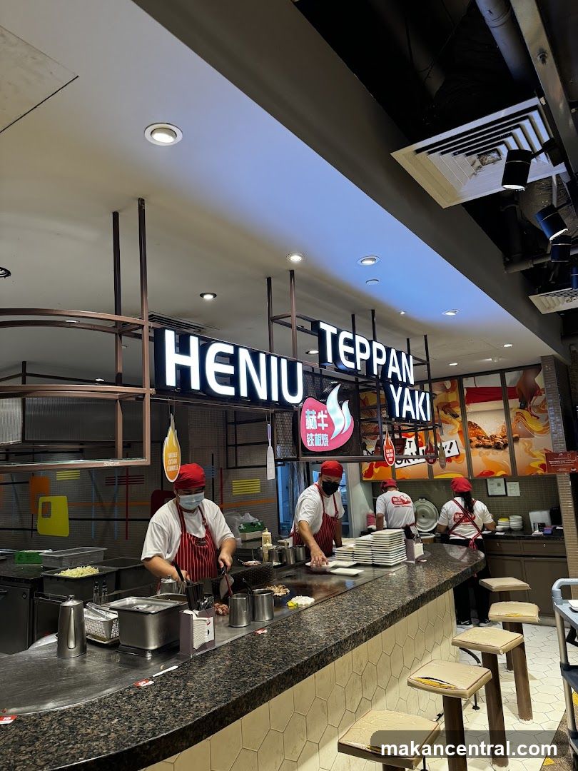Teppanyaki chefs preparing food