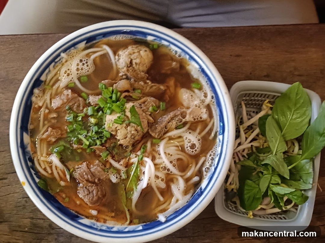 Bowl of Pho with Side of Bean Sprouts and Basil