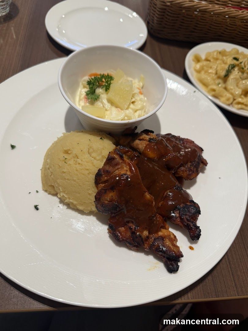 Barbecue chicken with mashed potatoes and coleslaw