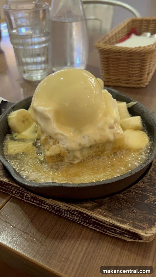 Sizzling dessert with ice cream and bananas