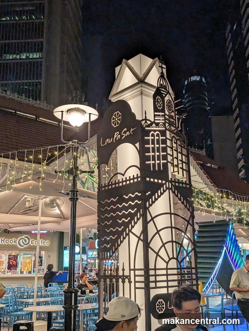 Night Market Scene with Lau Pa Sat Landmark