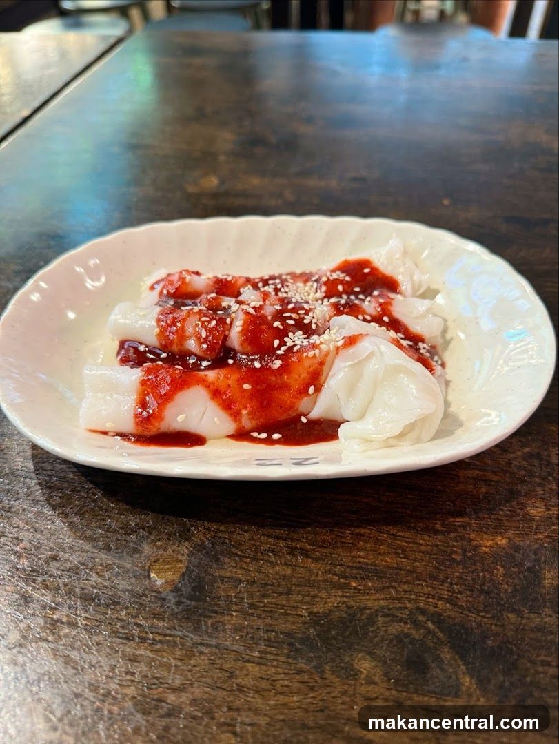 Cheung Fun with Sauce and Sesame Seeds